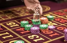 66RS casino presented on mobile device in Pakistan with slots and live games